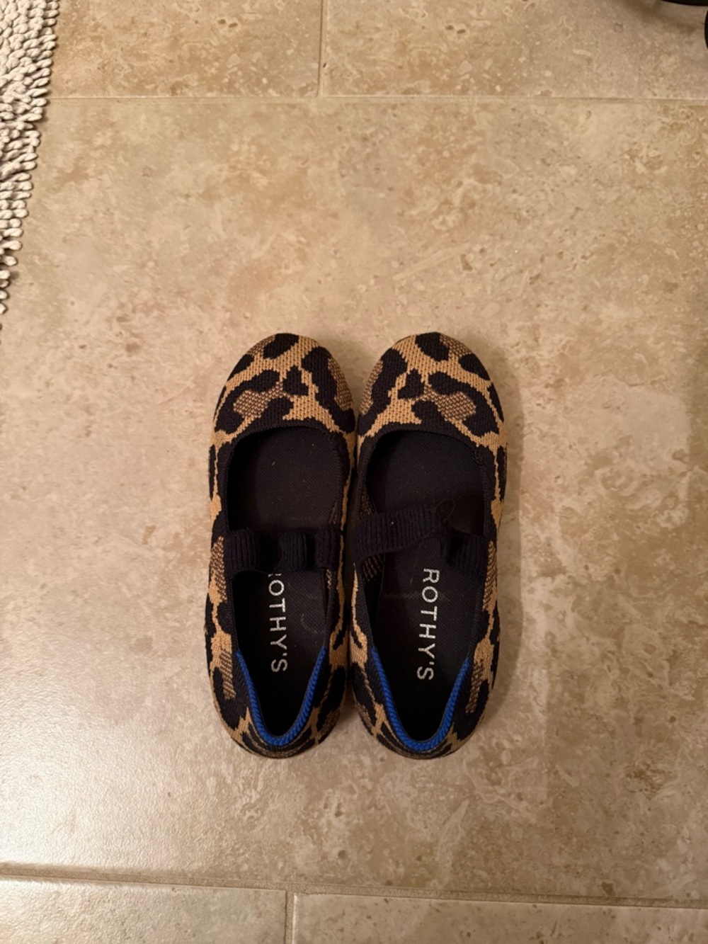 Rothy's Leopard Print Tan and Black Kids Slip-On Dress Shoes